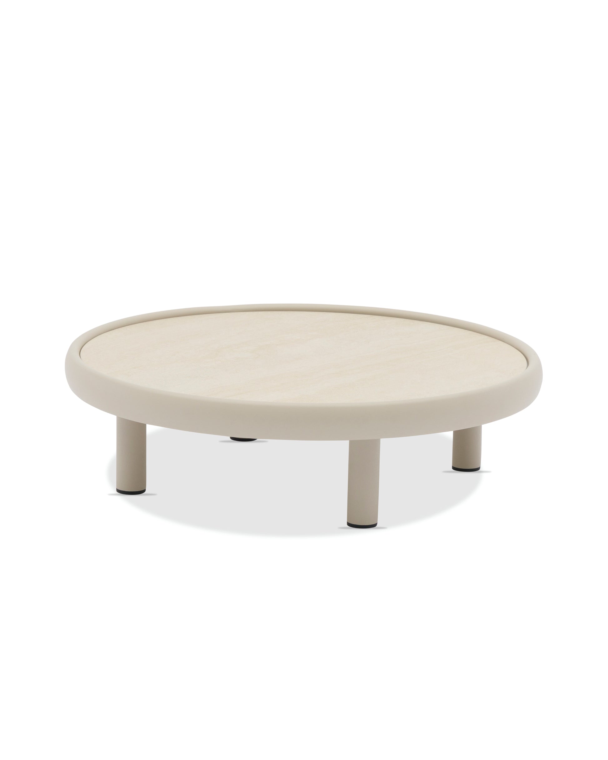 Round beige coffee table on a white background